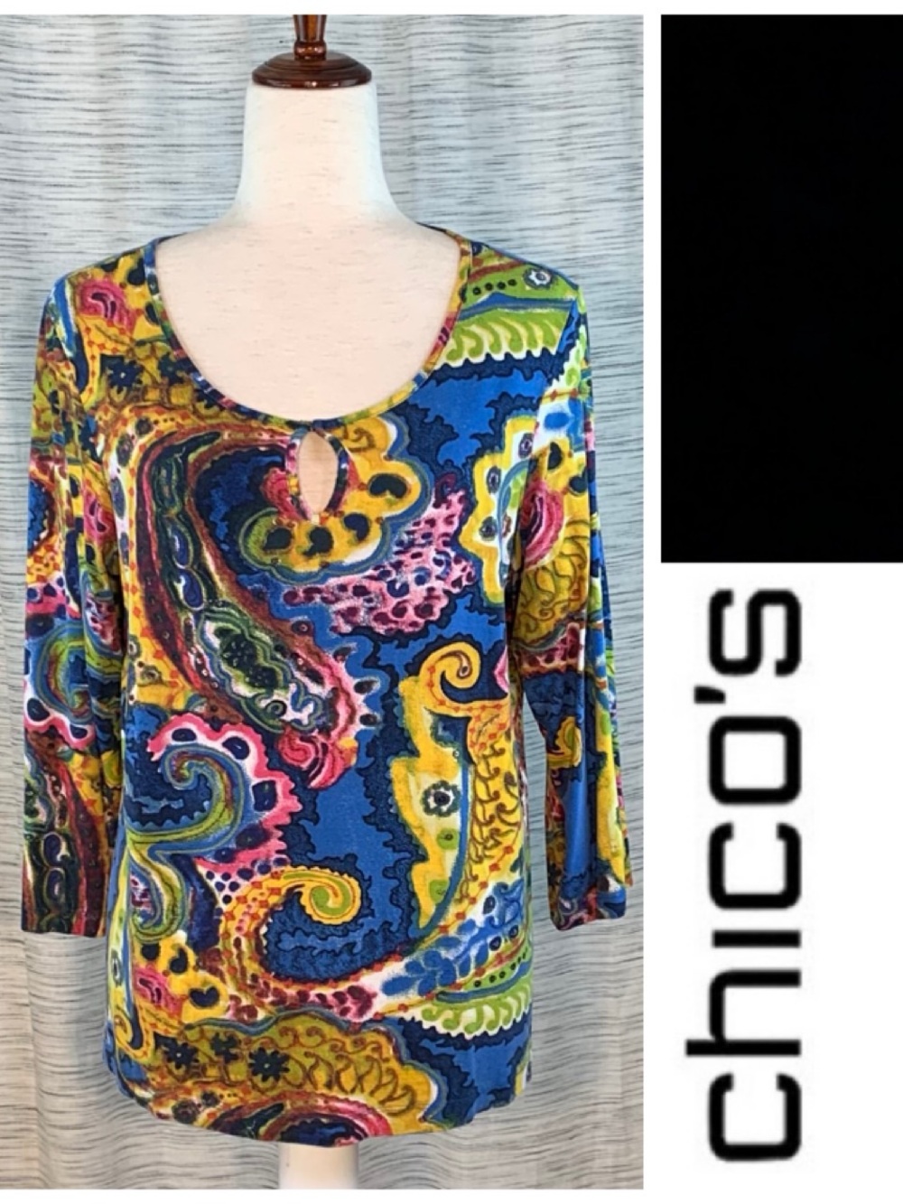 Chico’s bold multicolored paisley 3/4 sleeve pullover blouse.